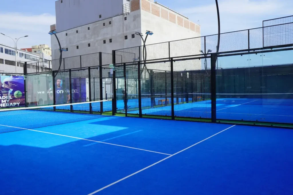 Modern paddle court facility blue surface