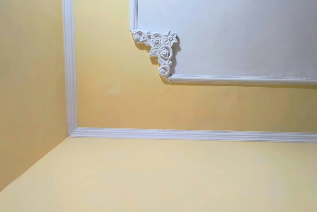 "Yellow wallpaper installation room corner detail